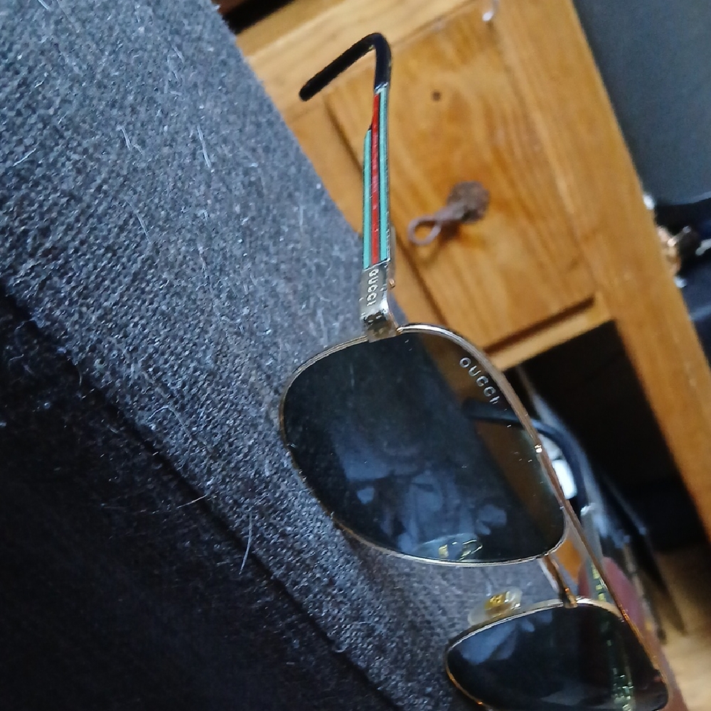 Gucci Gold Frame Sunglasses with Black Lenses